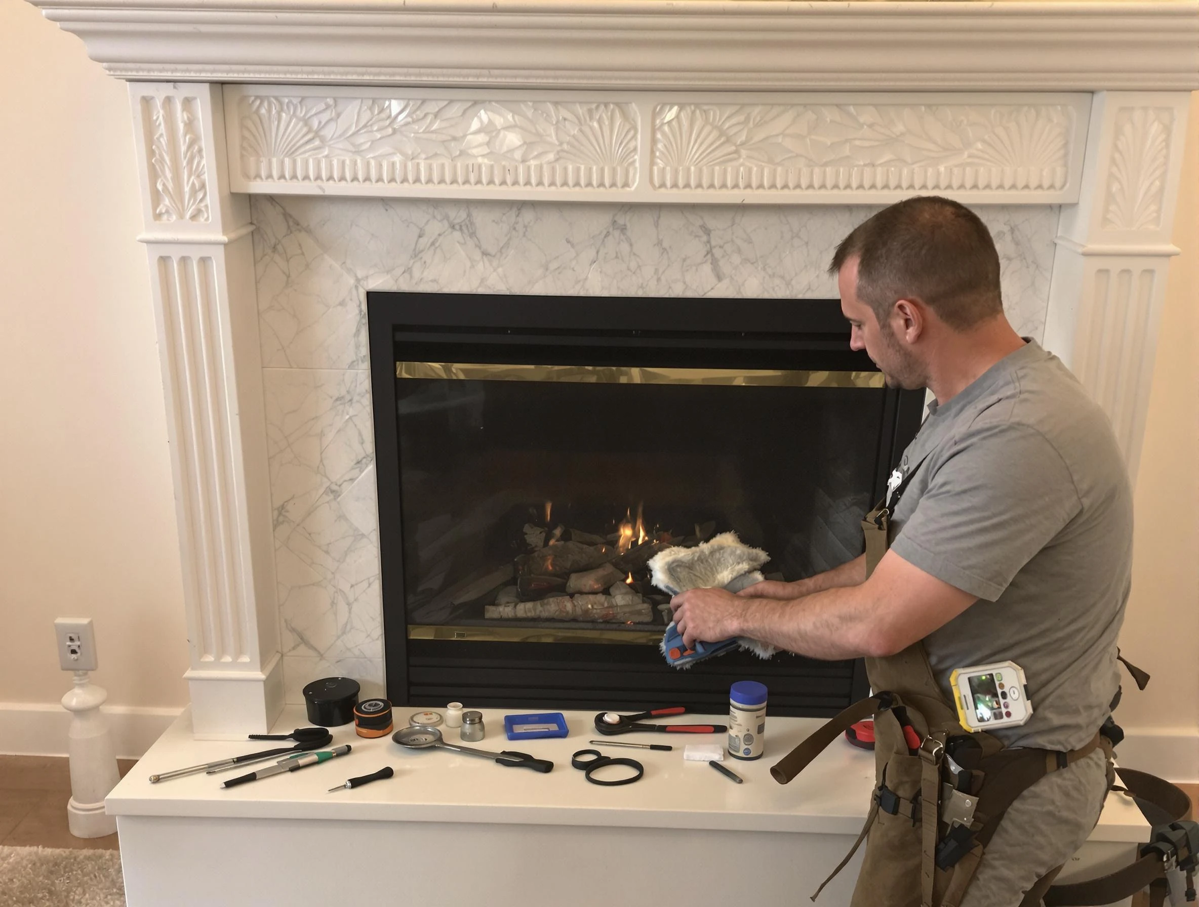 East Basin Chimney Sweep performing fireplace maintenance in East Basin, UT